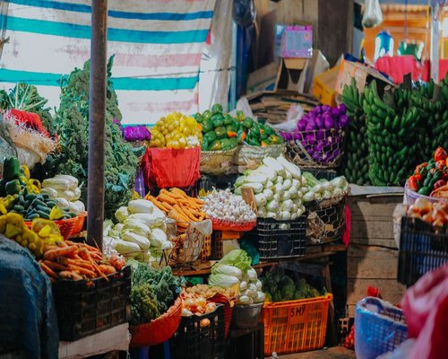 Colorful fresh vegetables displayed at a vibrant local market